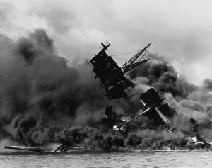 The USS Arizona burning after the attack on Pearl Harbor.